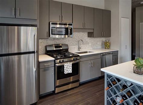 gray kitchen cabinets and stainless steel appliances|gray stainless steel cabinets.